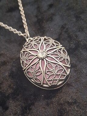 Silver Filigree Oval Pendant Necklace with Pink Pearl Backing. 26 In Long